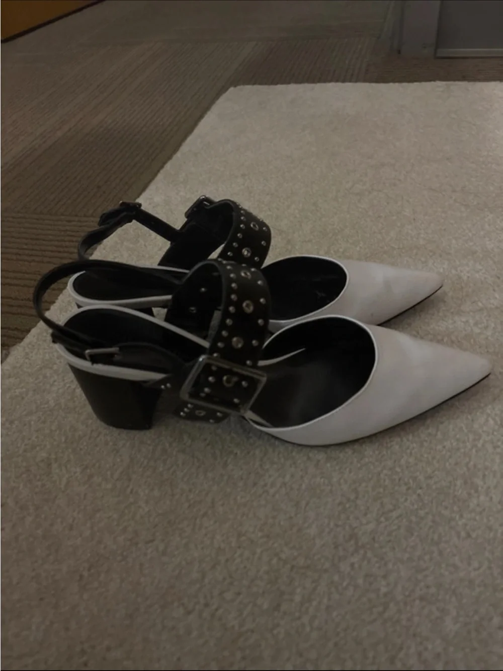 Charles & Keith White Pointed Slingback Heels with Black Studded Straps